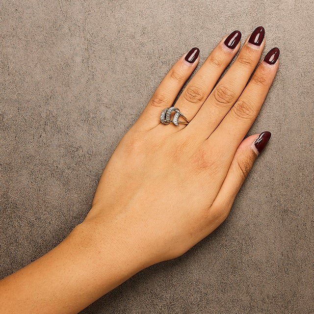 Early 21st Century 14K Yellow Gold Plated .925 Sterling Silver 1/4 Cttw Diamond Interlocking Bypass Ring (I-J Color, I1-I2 Clarity) - Size 9 For Sale - Image 5 of 6