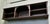 Long Gothic Carved Oak Wall Shelf with storage This charming long shelf has a geometric carved panel at the back of the...