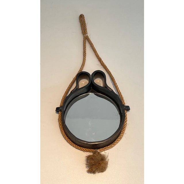 This interesting and unusual little mirror is made of ceramic and rope. There are some cooking defects but it is in good...