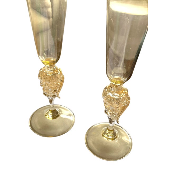 An exquisite pair of signed Murano champagne flutes by Nason Moretti, one of Venice’s most celebrated glassmakers. Each...