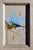 This oil painting captures a bird perched with a striking blend of blue and yellow hues that evoke a sense of tranquility....