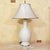Elegant vintage ceramic urn-form table lamp, likely late 20th century, circa 1980s–1990s. The glossy cream/off-white...