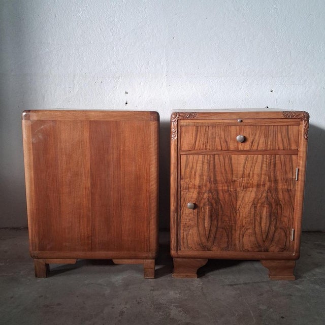 This high-quality pair of antique art deco bedside tables combines elegant design with thoughtful functionality. The...