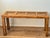 Lightweight Mid-century modern console table with cane panels.