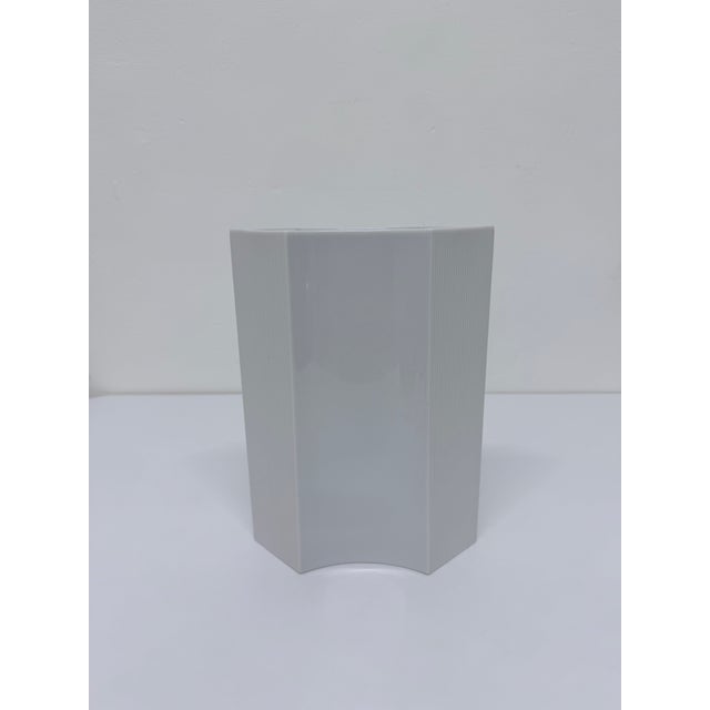 Original bright white bisque porcelain vase with linear groove pattern designed by Sami Wirkkala in the 1980s for Rosethal...