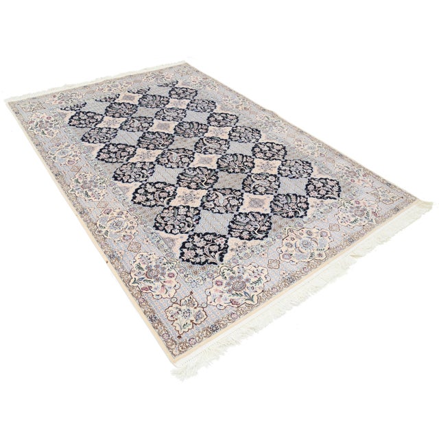 Nain rugs are renowned for their detail and fine use of outlining along the central motifs. Breaking from the classical...