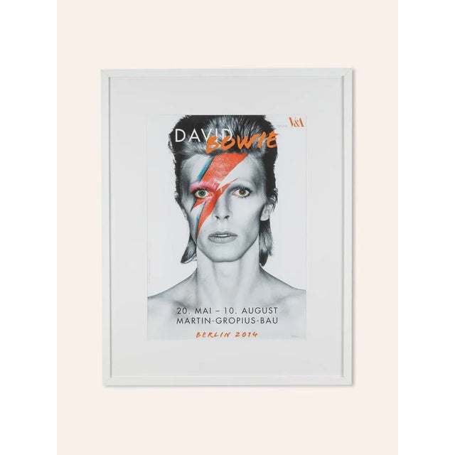 Original poster for the international exhibition "David Bowie" of the Victoria and Albert Museum in London shown in the...