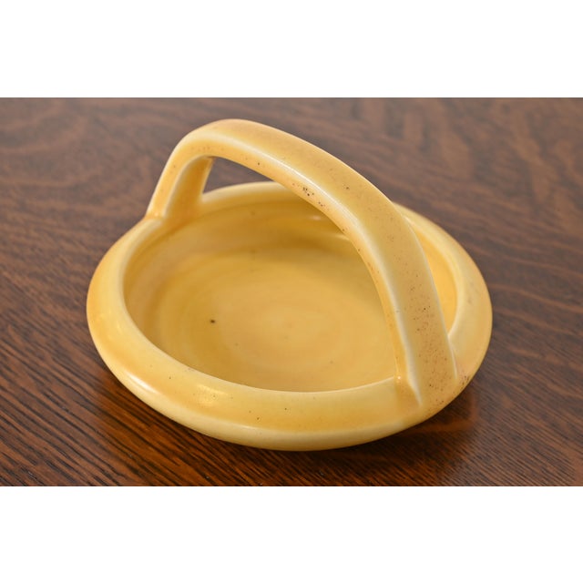 A gorgeous Arts & Crafts period glazed ceramic art pottery handled bowl, catchall, or ashtray By Rookwood Pottery USA,...