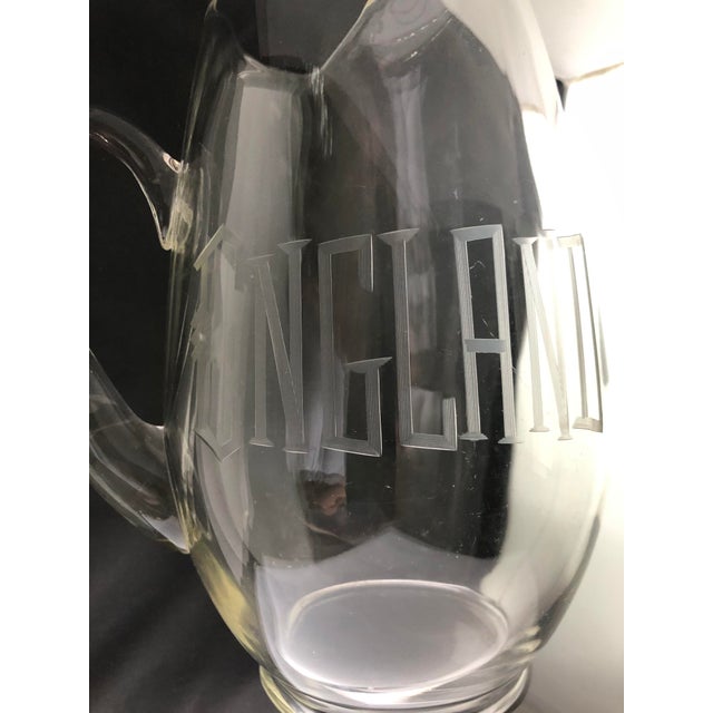 Vintage “England” glass carafe. This elegant and timeless design will delight your guests and enhance your decor....