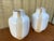 A Pair of Mid-Century Modern Two-Tone Studio Pottery Ceramic Vases. Circa 1970s Features beige drips with hints of gray...
