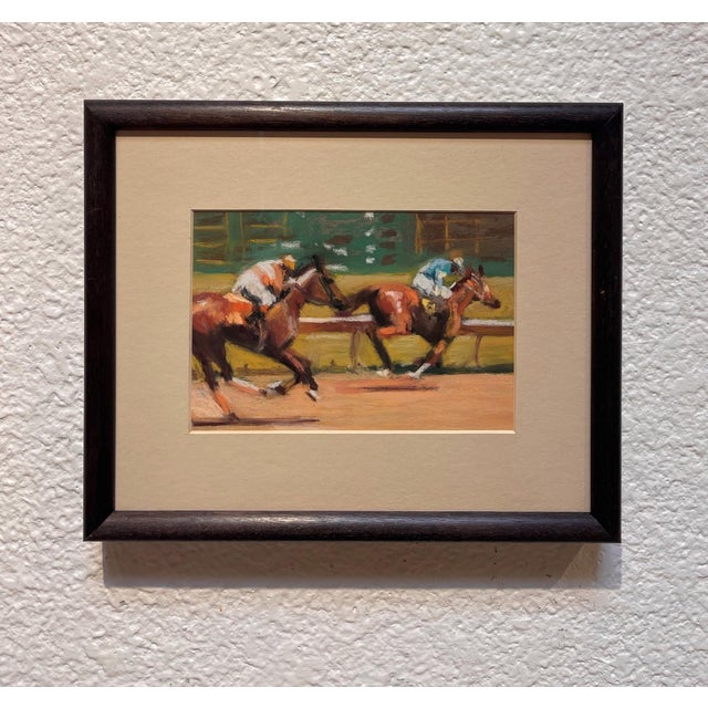 This pastel artwork captures the dynamic motion of a horse race, depicting two jockeys in vibrant colors as they gallop...