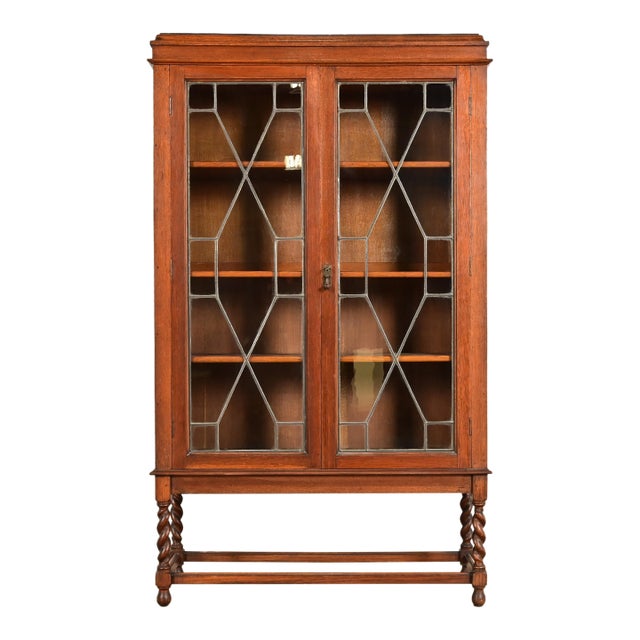 Stickley Brothers Style Antique Arts & Crafts Carved Oak Bookcase Cabinet With Leaded Glass Doors, Circa 1900 For Sale