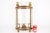 A vintage gilt brass demi-lune shaped wall lantern topped with two shell-and-foliate finials and matching acanthus...