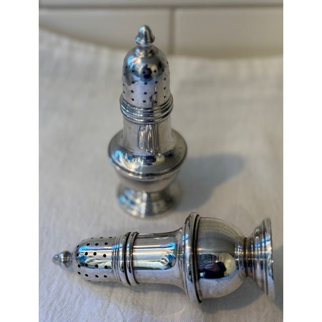 Beautiful set of sterling salt & pepper shakers. Manufactured by the Genova company, which was known for its elegant...