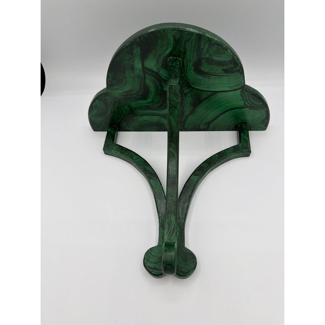 A classically shaped wall bracket or shelf for displaying those precious object Handmade of maple and painte in a faux...