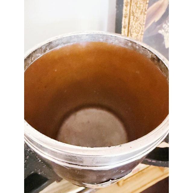 A stunning antique circa early 1900s loving cup style trophy handmade by Gorham from leather, copper and sterling silver....