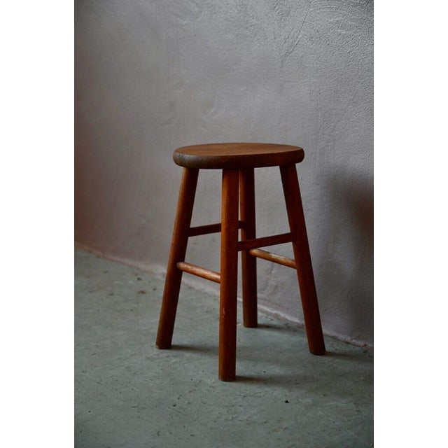 Made entirely of wood, this charming rustic seat looks like it came straight from a farmhouse or mountain chalet. The...