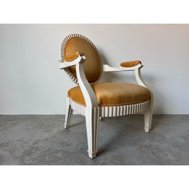 Elegant and sculptural Donghia “Grand Flute” armchair, attributed to designer John Hutton, showcasing a refined...