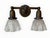 Our designers love using sconces like this one in a bathroom over a mirror for his and her’s sinks. This fixture is an...