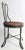 Charming childs, or doll size ice cream parlor chair. This example has unusual open work feet, a metal frame and wood...