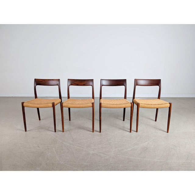Beautiful and extremely rare set of four dining chairs from the traditional Danish manufacturer JL Mollers Mobelfabrik,...