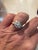 Gorgeous vintage estate platinum and diamond cluster ring with two side baguette diamonds. Size 4.5. Marked for platinum....