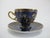 19th century, Karlsbad Hermann Voigt, Bohemia porcelain cup and saucer. Cobalt blue with ornate gilt accents and finely...