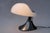 A highly collectible italian table lamp, model cobra, designed by guzzini in the late 1970s. this compact and elegant...