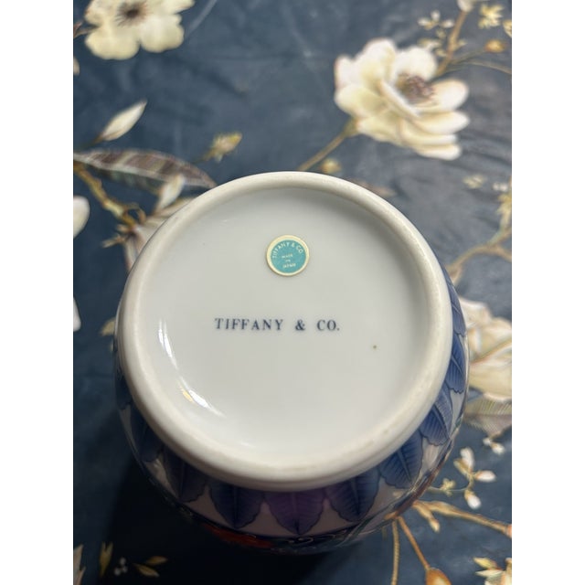 Add timeless elegance to your collection with this **Vintage Tiffany & Co. Signed Blue & White Floral Porcelain Vase**....