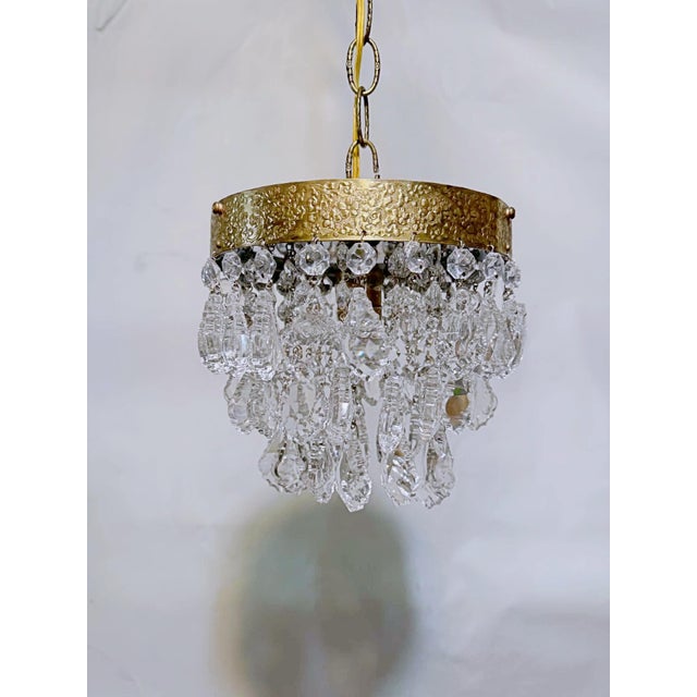 Bring an exquisite layer of mid-century glamour and dynamic texture to your home with this vintage crystal waterfall...