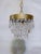Bring an exquisite layer of mid-century glamour and dynamic texture to your home with this vintage crystal waterfall...