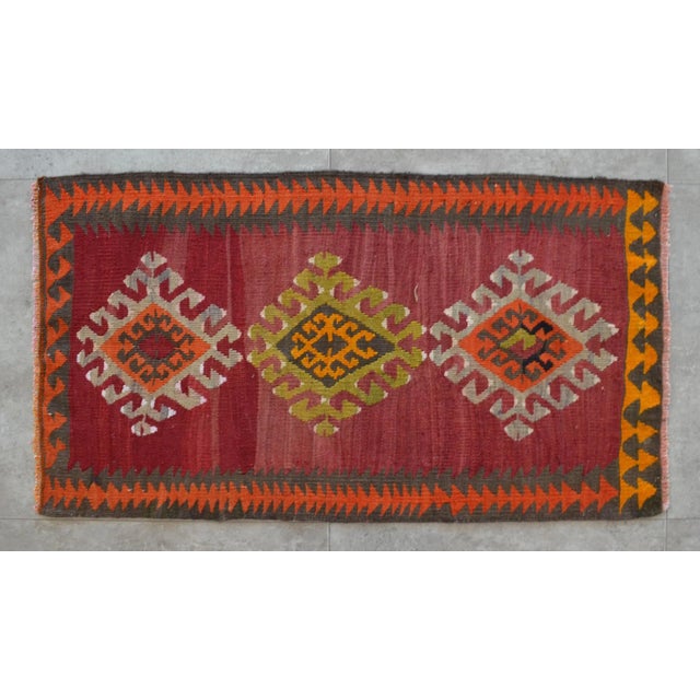 This handwoven vintage Kilim rug has fun & cheerful colors. This petite Kilim is a really rare find! The colors, the...