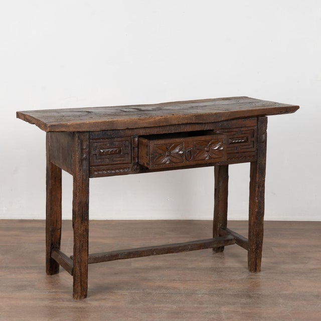 18th century Portuguese console table crafted in chestnut with a single drawer. The table features traditional Portuguese...