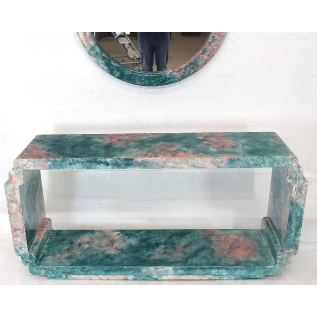 Artistic lacquered set of round frame mirror with matching console table. Mirror measures 35" inches diameter. Made in the...