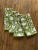 Hand block printed napkin set featuring a classic and timeless floral design in olive green. These artisan sewn cotton...