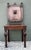 Exude an air of timeless dignity with this stately vintage English hall chair, a fine example of Gothic Revival...
