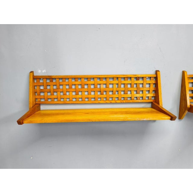 A rare pair of mid-century folding wall shelves produced by uluv in 1960s czechoslovakia. Crafted from maple wood and...