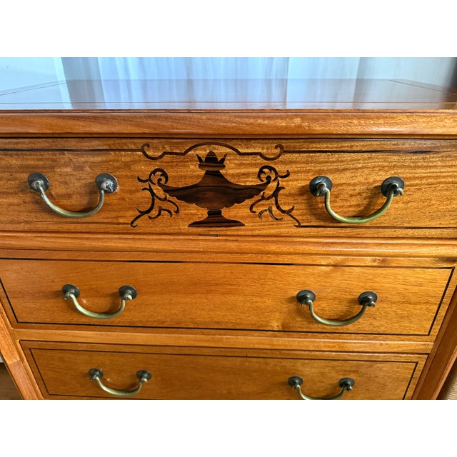 Striking and unusual -- perhaps one-of-a-kind -- 1930s mahogany dresser with clean lines, architectural corner details,...