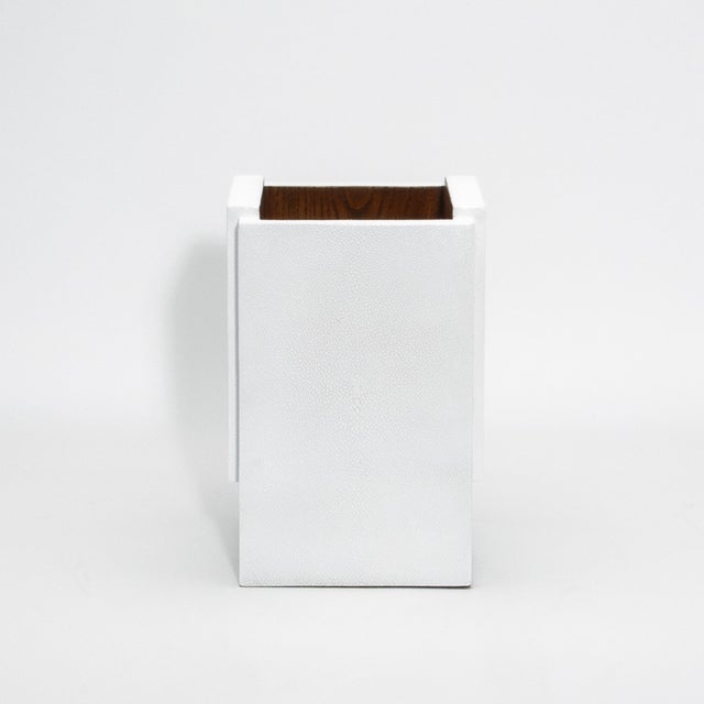 The White Shagreen Waste Bin with Wood Interior by R&Y Augousti is a stunning blend of luxurious craftsmanship and...