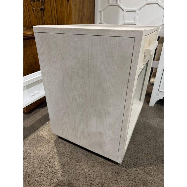 This refined nightstand from Art Furniture’s Cotiere collection embodies understated modern elegance with a soft, coastal...