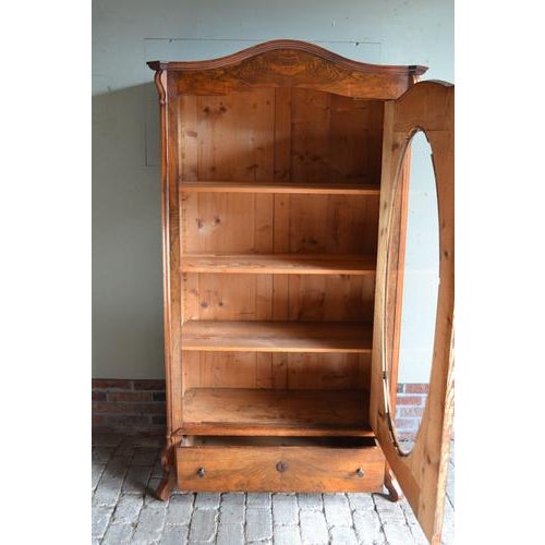 19th-century German walnut display cabinet, shop cabinet, china cabinet, bookcase, or library cabinet. The height is 180...