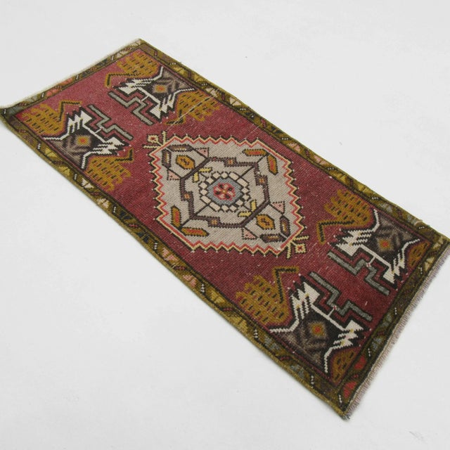 Vintage handknotted decorative mini rug from Konya region of Turkey. Approximately 50-60 years old. In very good condition.