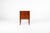 Beautiful antique bedside cabinet with roller door, standing on tapered legs. The top features a small, original raised...