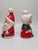 This is a vintage Lefton Mr. and Mrs. Claus salt and pepper shaker set, featuring a mid-century modern design perfect for...