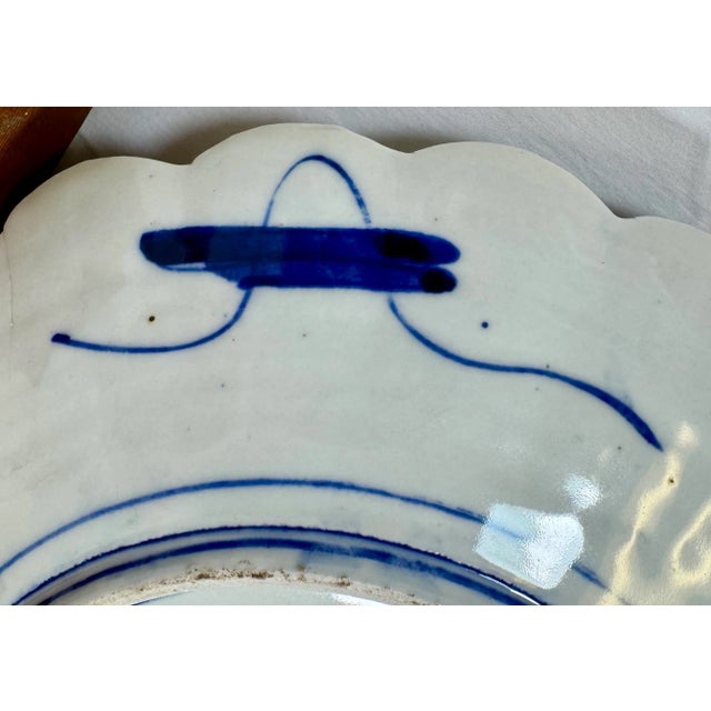 Large Antique Scalloped Edge Porcelain Imari Plate Decorated With Rich Colored Floral & Landscape Scenes From Japan - Circa 1880 For Sale - Image 11 of 11