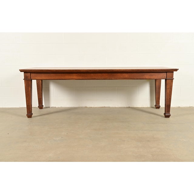 An exceptional antique Mission or Arts & Crafts period quarter sawn oak dining table or harvest table In the manner of...