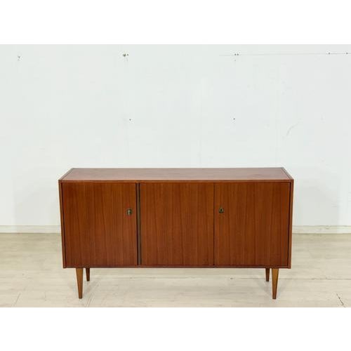 For sale is a beautiful vintage sideboard from the 1960s. This piece of furniture impresses with its simple, timeless...