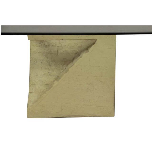 Superb postmodern sculpted Mactan stone and Glass Coffee Table with modernist design, elegant and luscious, ca 1970s,...