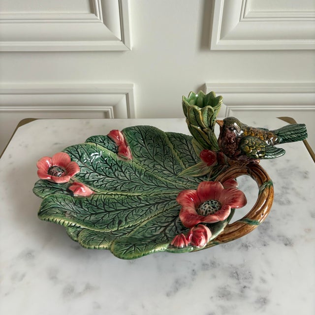 This is a 19th-century Majolica platter featuring a bird perched on a branch amidst flower and leaves. Colorful glazes and...