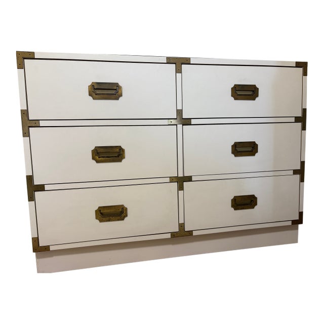 1960s White Campaign-Style Dresser Featuring Characteristic Brass Hardware, Including Recessed Pulls and Corner Brackets. For Sale